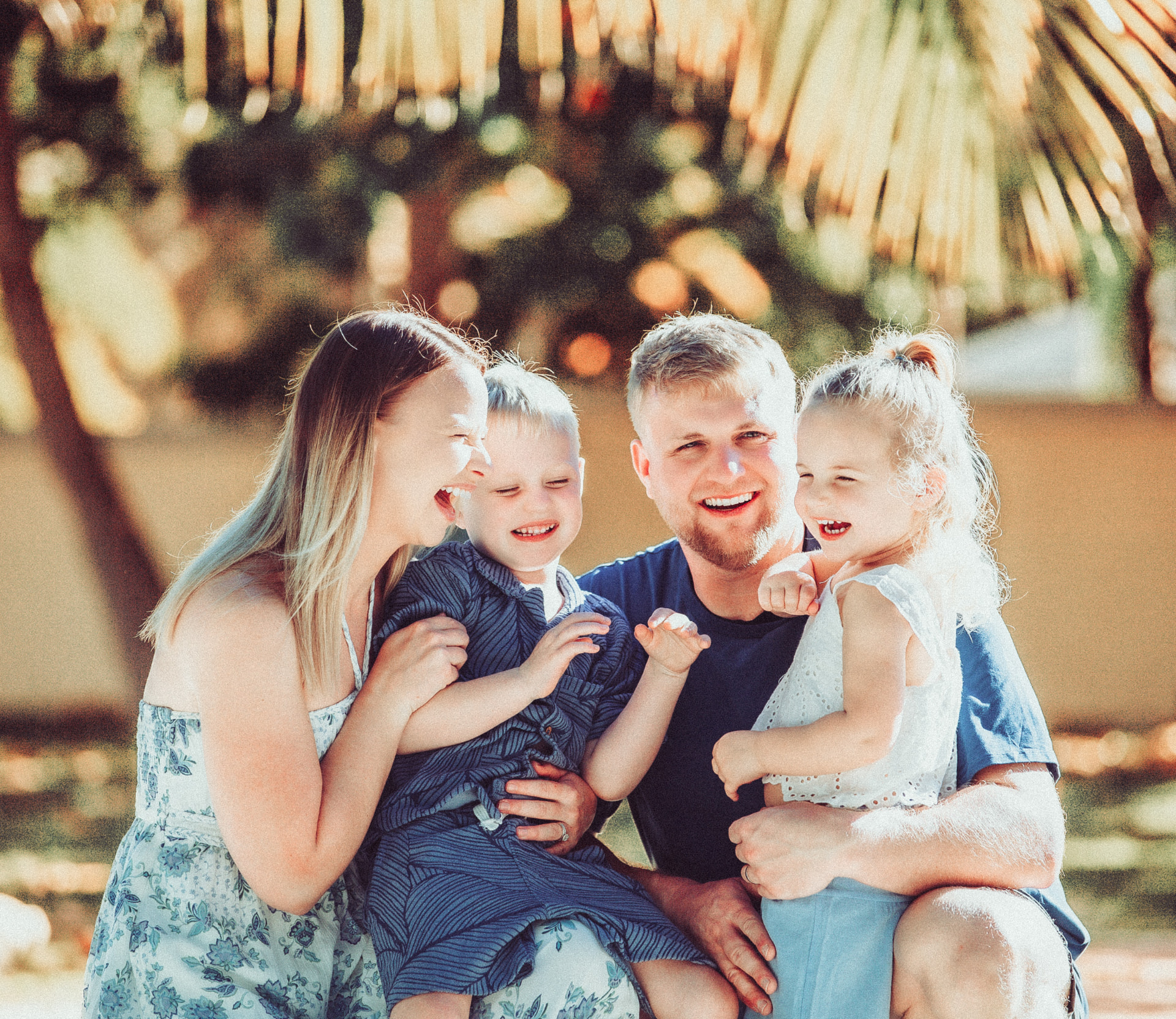Family laughing together during a Grand Cayman session