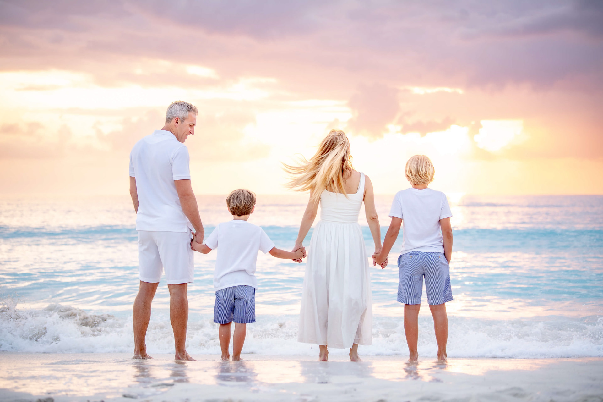 Family walking together in warm evening light
