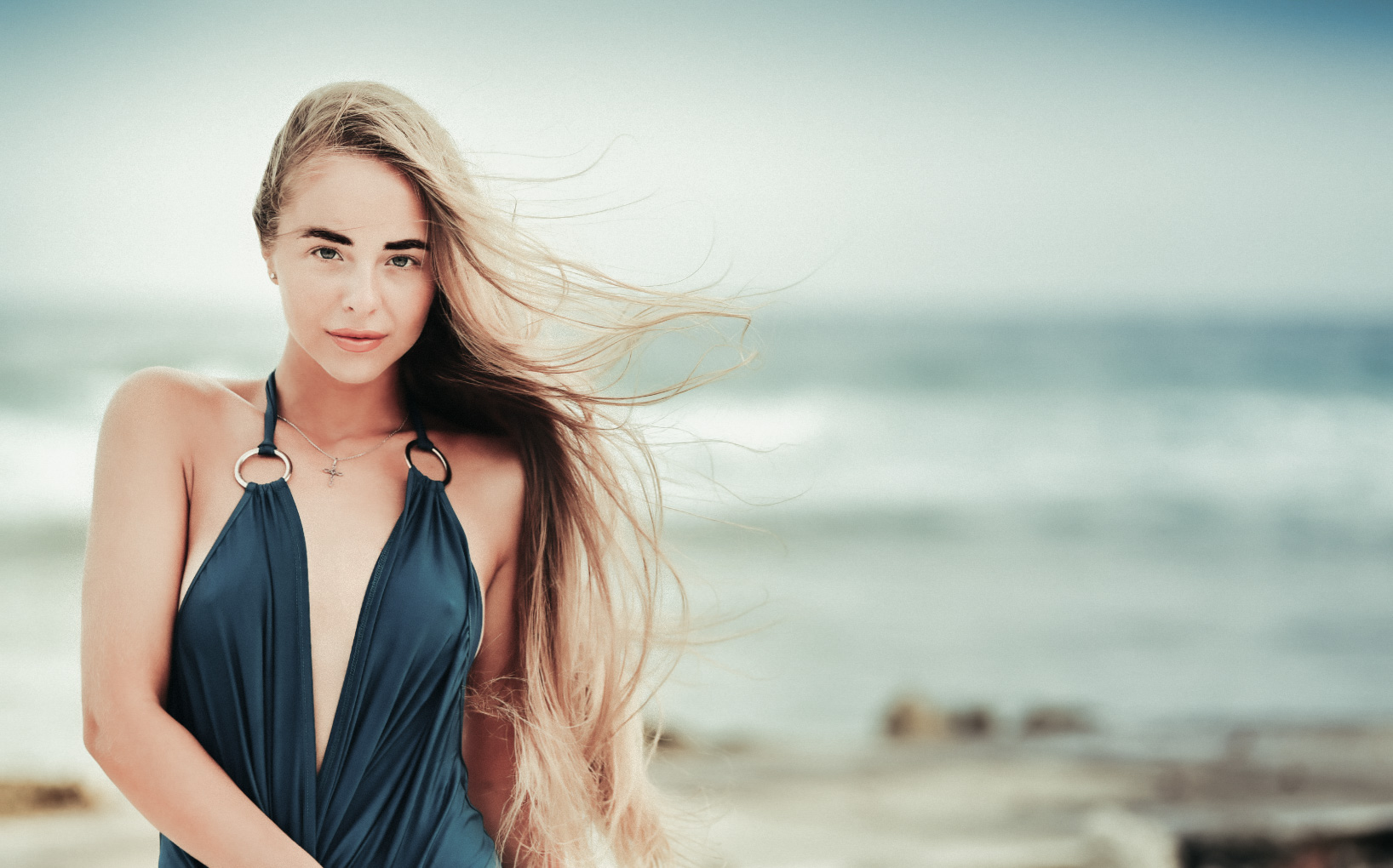 Wind-swept portrait beside the Caribbean Sea